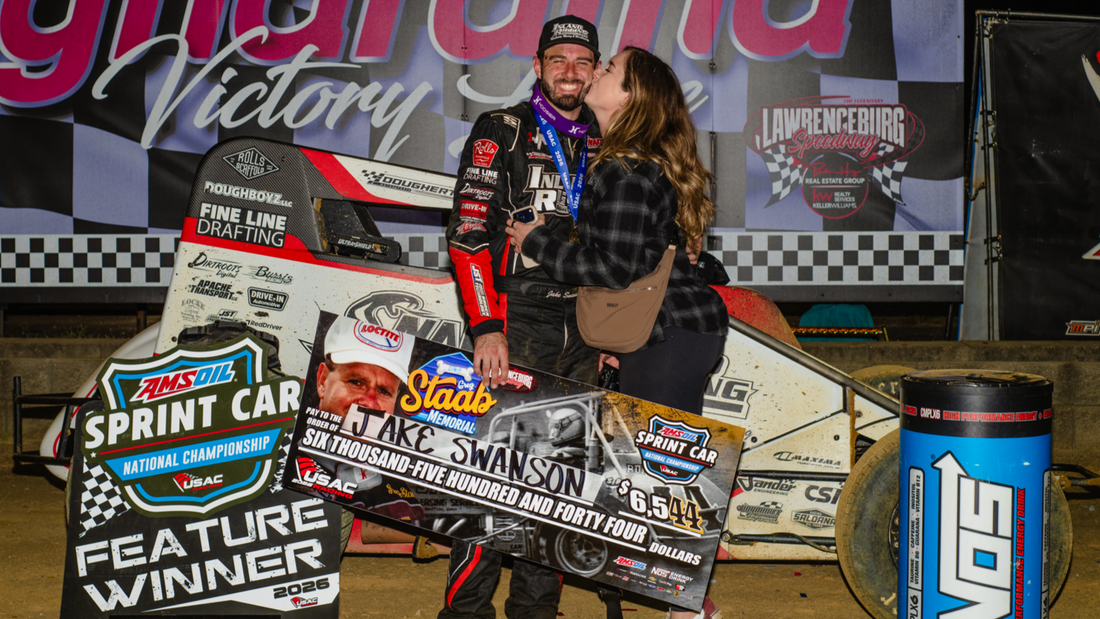 Jake Swanson celebrates his Greg Staab Memorial victory at Lawrenceburg Speedway. Ryan Sellers photo via USAC.